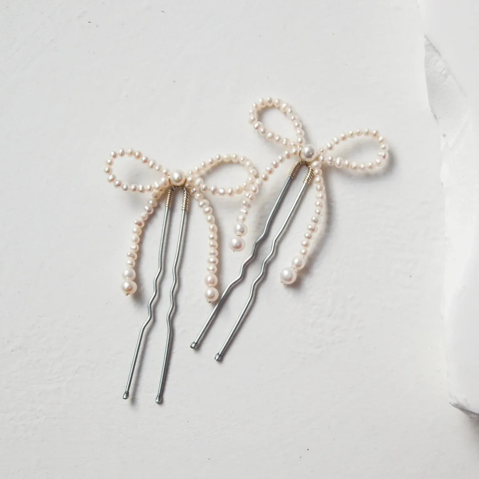 The Mini Pearl Bow Hair Pins (SET of 2)
