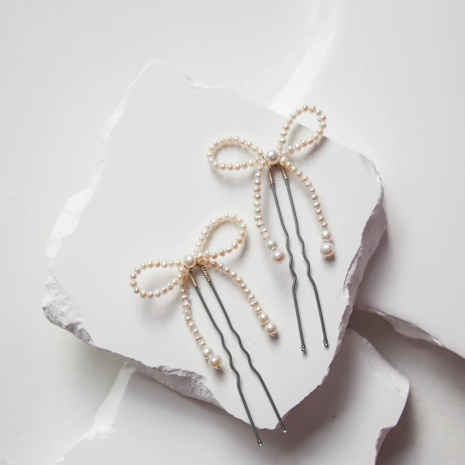 The Mini Pearl Bow Hair Pins (SET of 2)